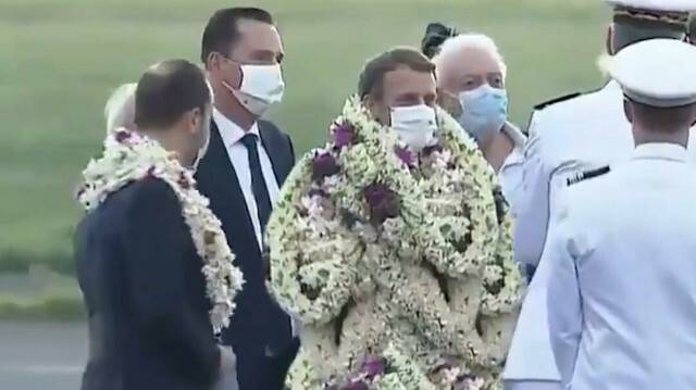 'Emmanuel Bouquet': Macron’s flower-covered arrival goes viral