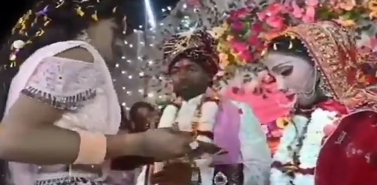 Bride shot during wedding ceremony 