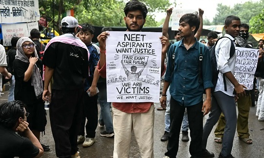 Modi announces panel to reform India's exam system; anti-govt graffiti at protest site painted over