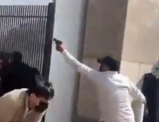 Photo Share of Alleged Armed Protester at US Consulate Sparks Debate