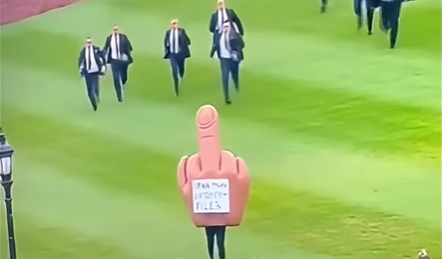 Costumed Protester in Inflatable Middle Finger Outfit Sprints Over White House Lawn