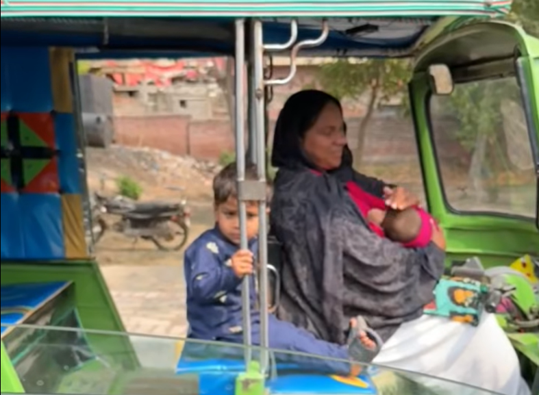 Video of mother driving rickshaw with kids wins hearts