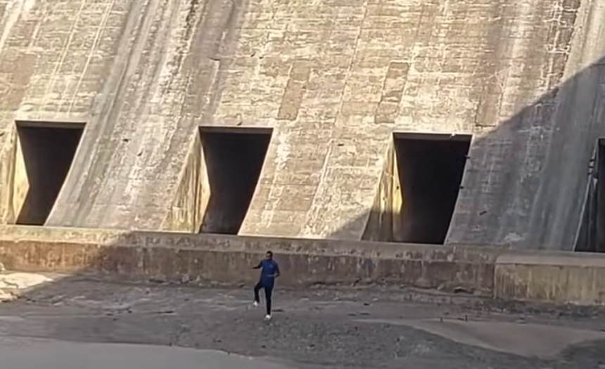 Man’s narrow escape caught on camera just before dam begins water release