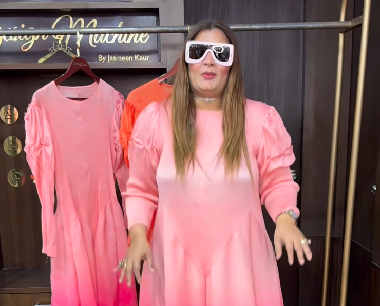 'Just looking like a wow' woman is back — and her new dress is breaking the internet again