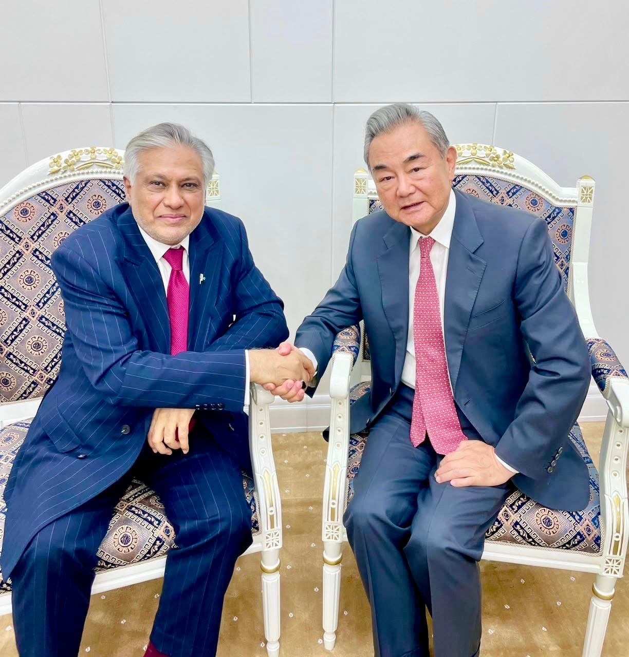 Dar, Wang Yi review bilateral ties, regional cooperation on SCO sidelines