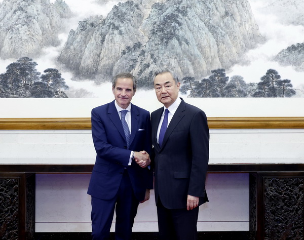 Wang Yi warns of nuclear risks, urges global unity in talks with Rafael Grossi
