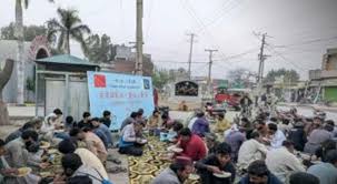 Chinese-Pakistani “Caring Kitchen” provides Ramazan meals to hundreds of families