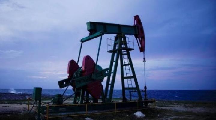 Oil eases on demand concerns after jump in US stockpiles