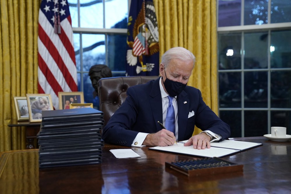 On day one, Biden targets Trump policies on climate, coronavirus
