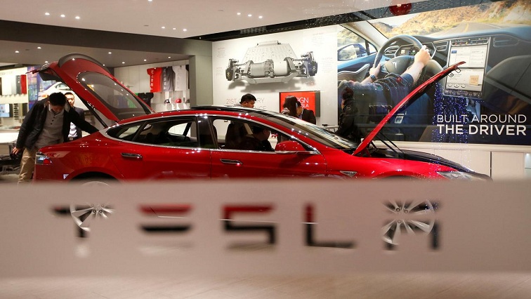 Tesla market value crosses $800bn for the first time