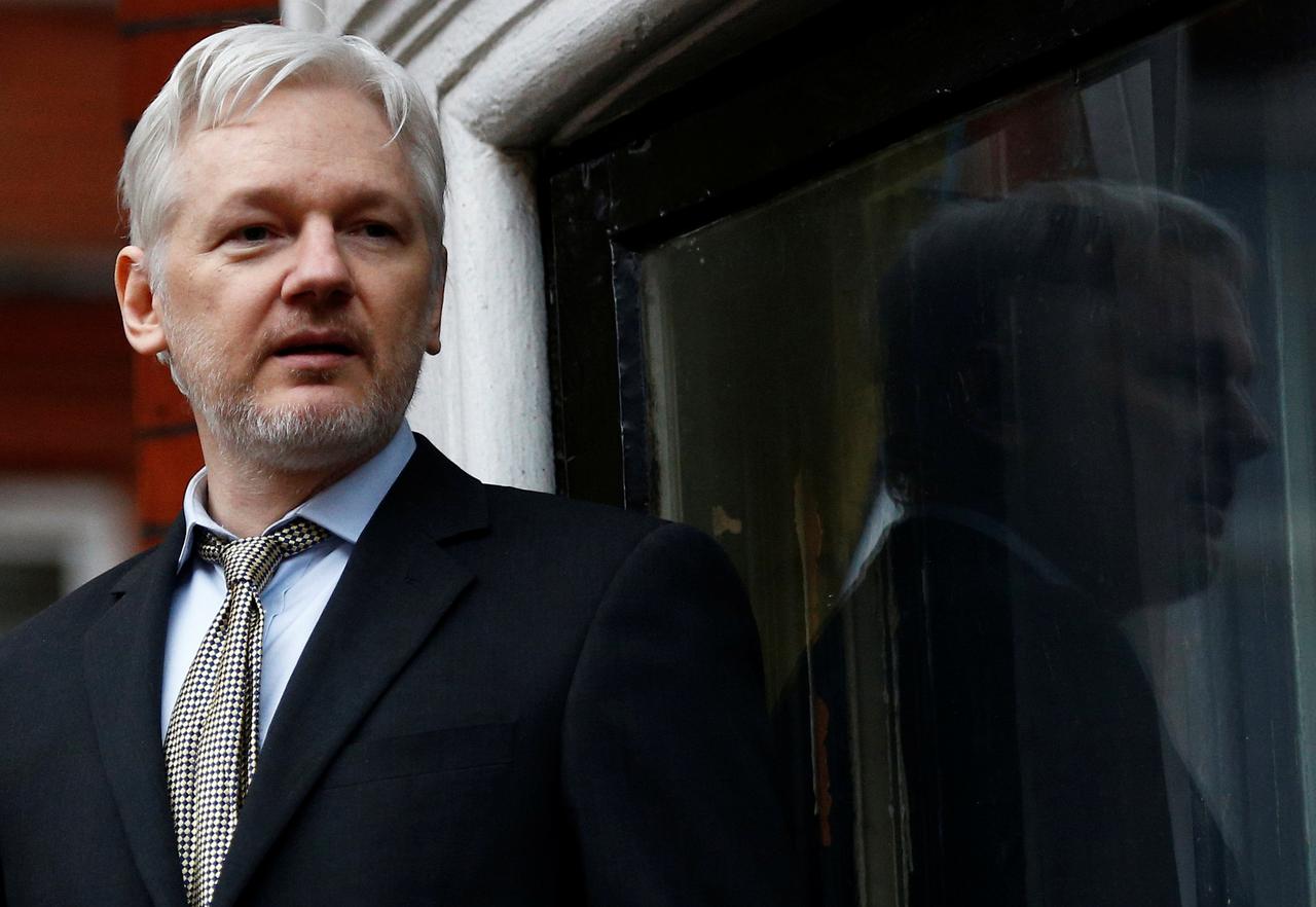 Assange 'free to return home' once legal challenges over, Morrison says
