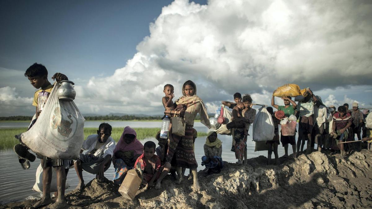 Bangladesh says under 'no obligation' to accept stranded Rohingya refugees