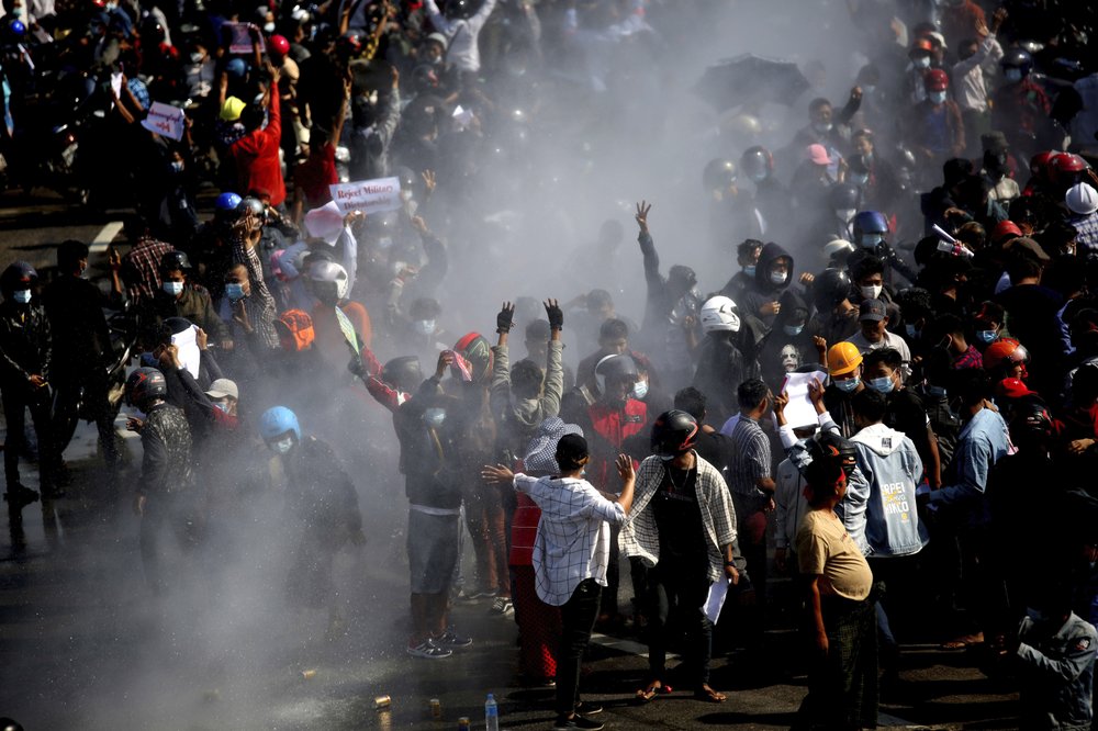 Water fired at crowd as anti-coup protests swell in Myanmar
