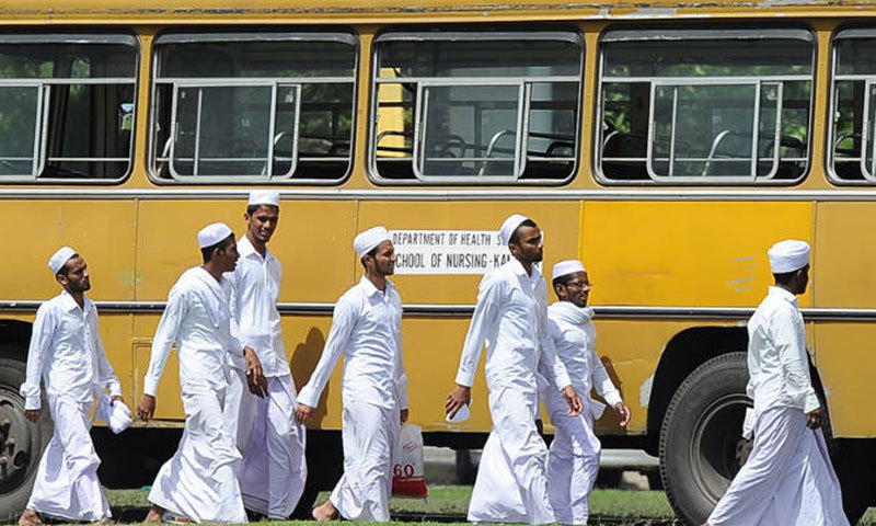 Sri Lanka Muslims protest Covid cremations as PM Imran visits