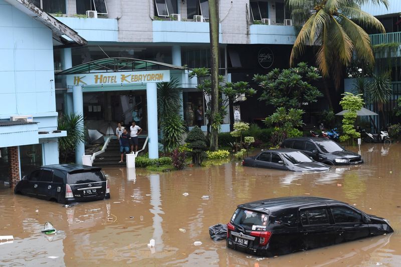 Indonesia flood death toll rises to 58, with 35 still missing