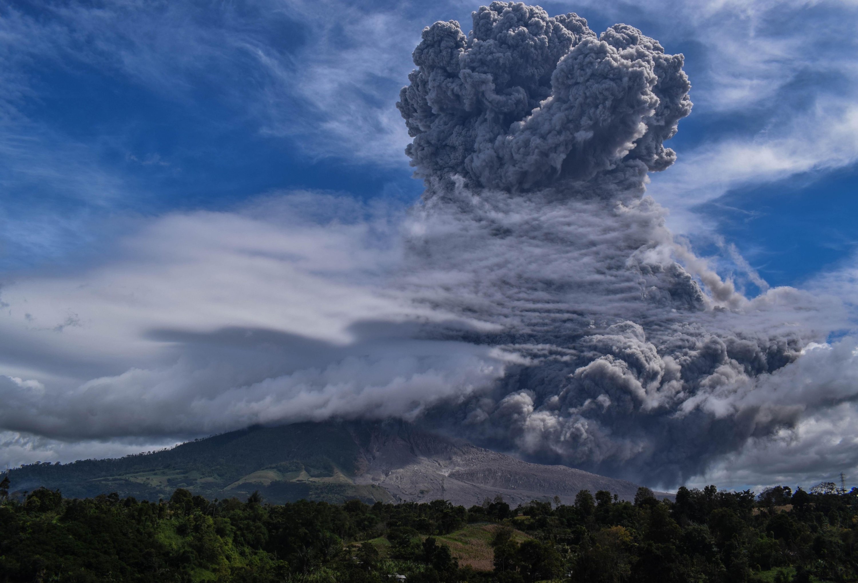 Indonesia's Mount Sinabung volcano spews ash into sky