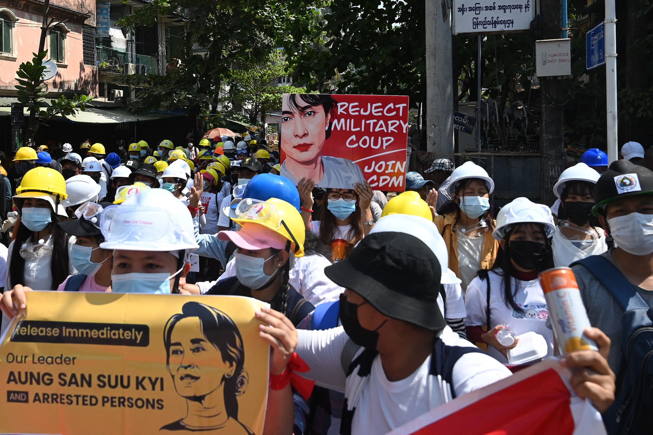 Unions call for total strike in Myanmar; Suu Kyi party official dies in custody