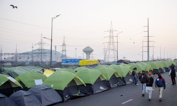 Indian farmers plan major road blockade outside Delhi to mark 100th day of protests