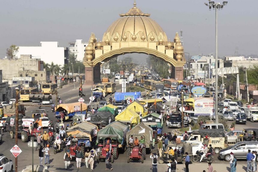 Indian farmers block highway outside Delhi to mark 100th day of protest