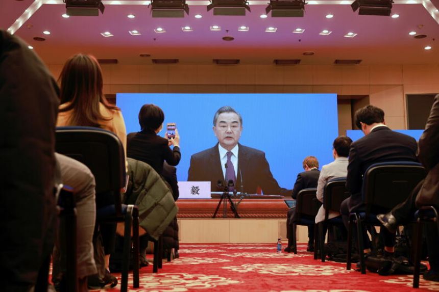 Wang Yi urges US reset, rejects Xinjiang 'lies'