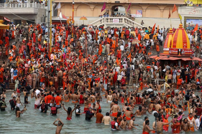 India's new Covid-19 infections hit record as Hindu devotees immerse in Ganges