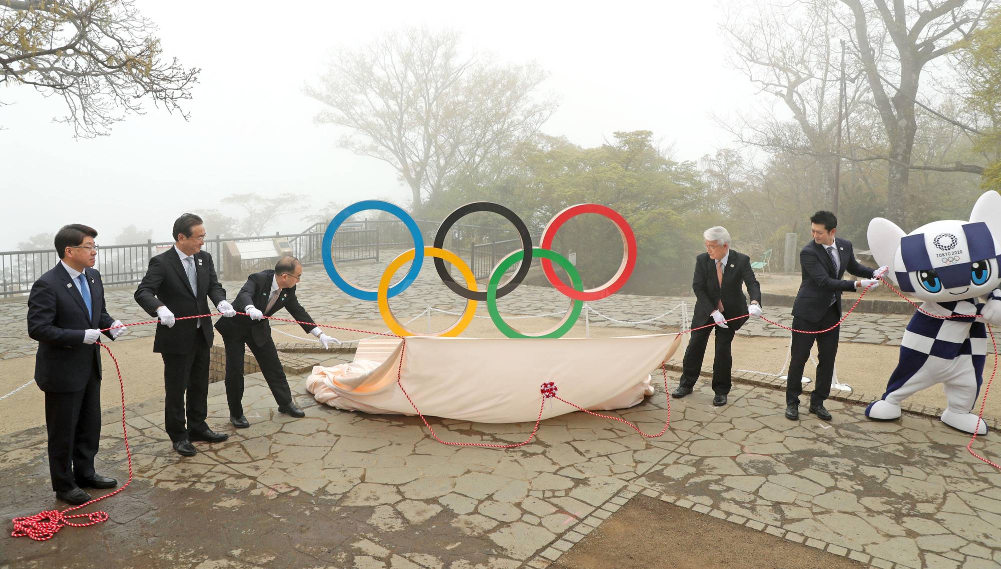 Tokyo Olympics chief commits to Games as infections surge
