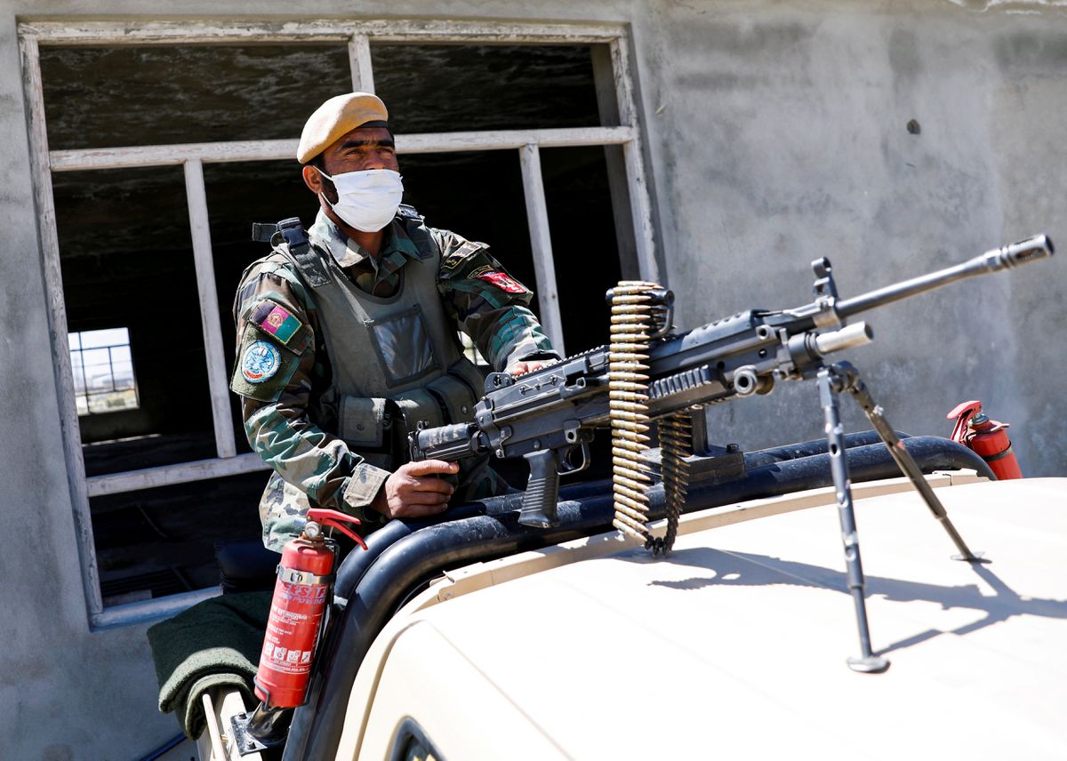 As US prepared exit, Taliban protected foreign bases, but killed Afghans