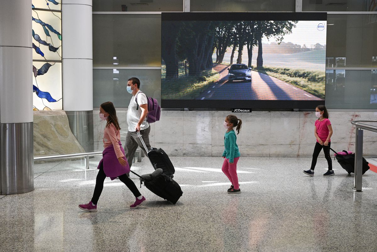 Australia bans arrivals from India, says offenders face jail, fines