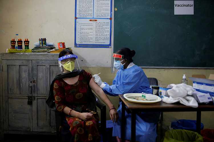 Women falling behind in India’s Covid-19 vaccination drive