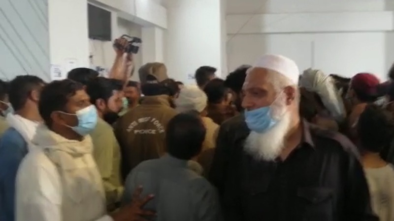 People protest shortage of AstraZeneca jabs required for foreign travel