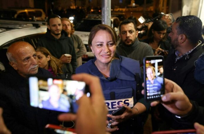 Israel arrests Jerusalem activist as reporter recovers