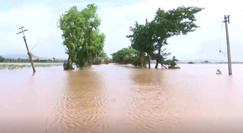 Flash floods kill at least 4 in held Kashmir, dozens missing