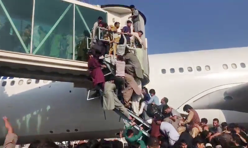 Casualties reported amid chaos at Kabul airport as Afghans attempt to flee