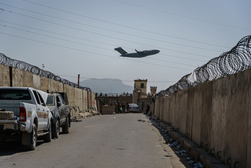 Rockets fired at Kabul airport as US troops race to complete evacuation