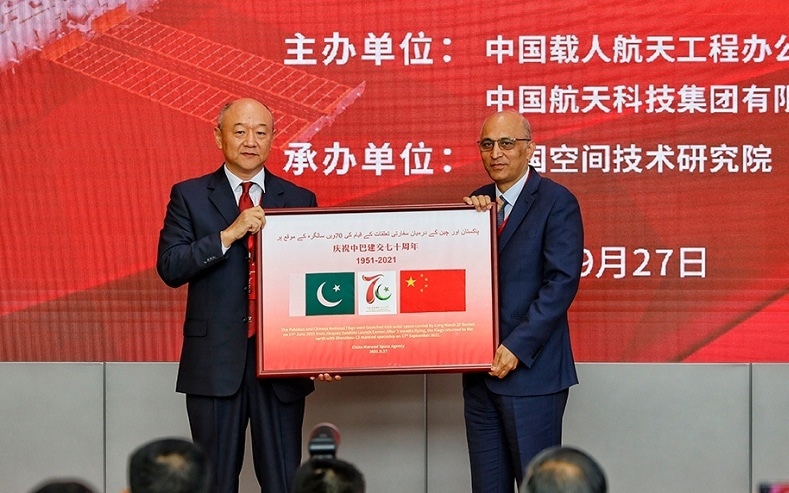 Pakistan flag returned from space journey handed over to Pakistan embassy in Beijing