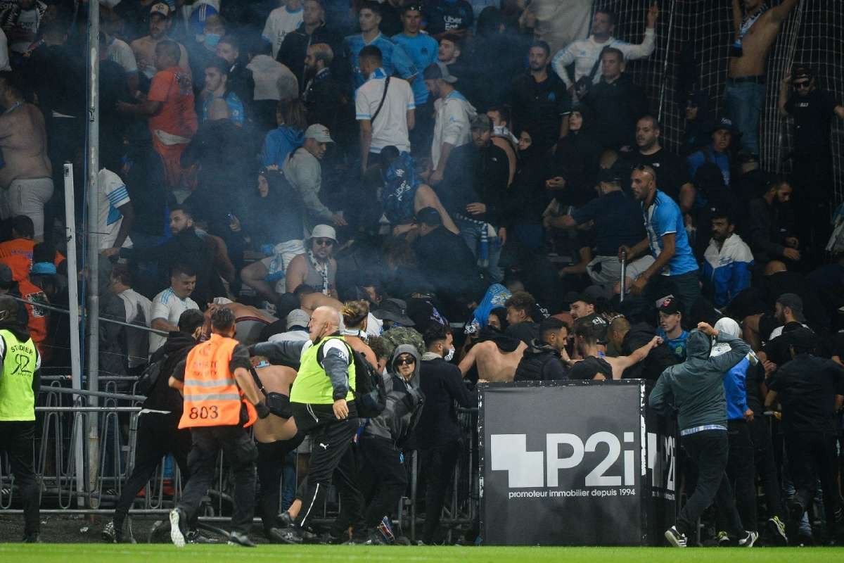 French football wrestles with violence in stadiums as fans return