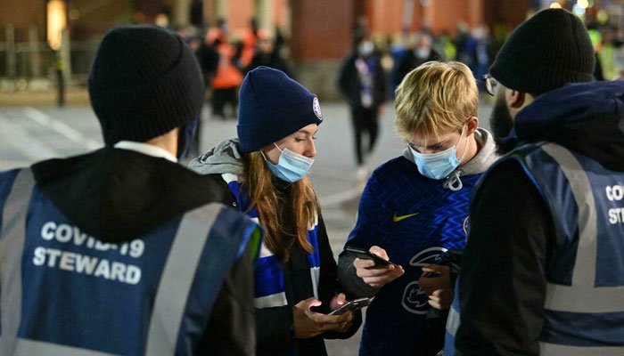 Sporting world battles surging Covid cases