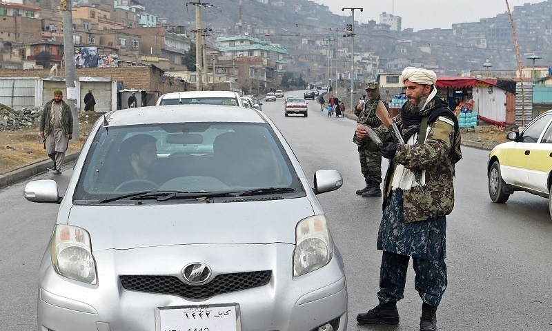 Suicide bomber shot dead in Kabul as Taliban fighters gather for passports