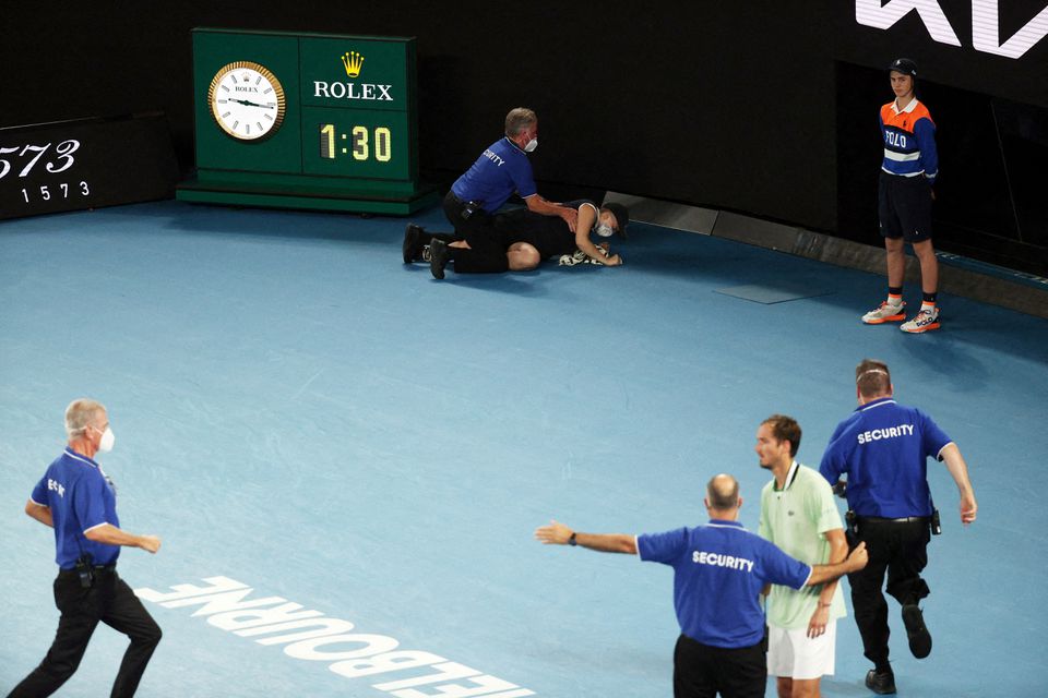 Intruder halts play in men's singles final at Melbourne