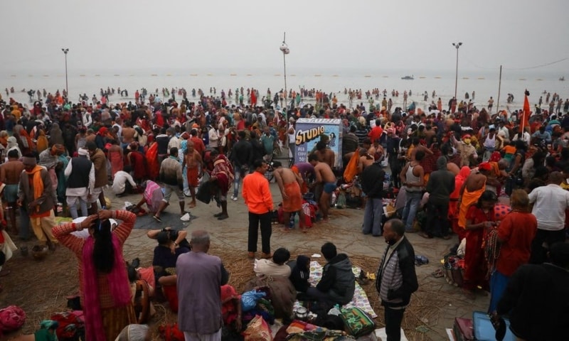 Hundreds of thousands of Indians gather for holy dip, defying Covid-19 surge