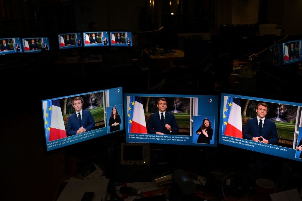 Macron takes EU reins as election looms