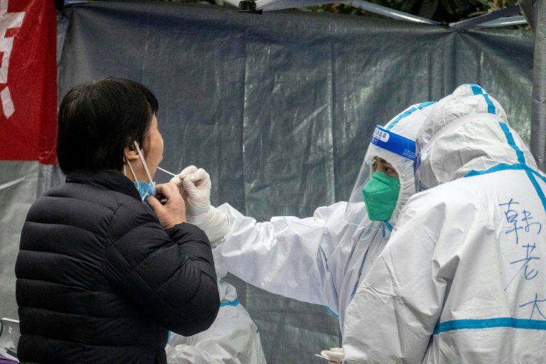 China says Xi'an outbreak controlled but other cities face restrictions