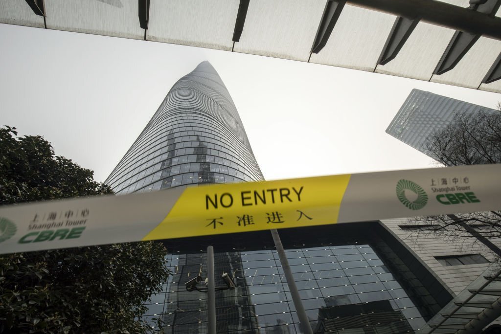 China ends quarantine for overseas travellers