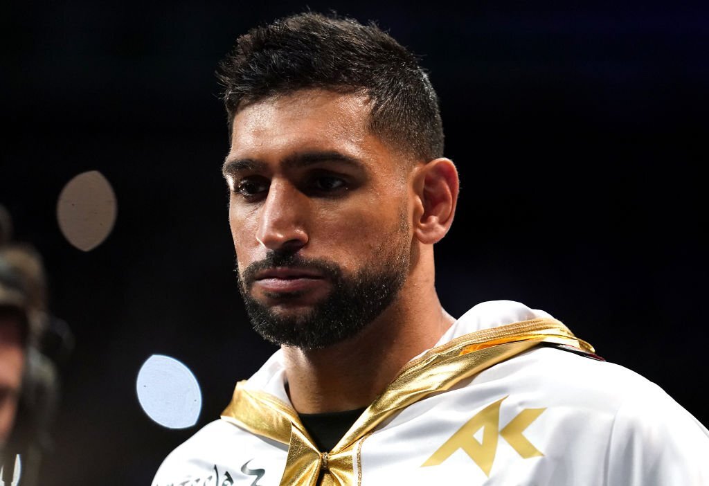 Former champion Amir Khan announces retirement from boxing