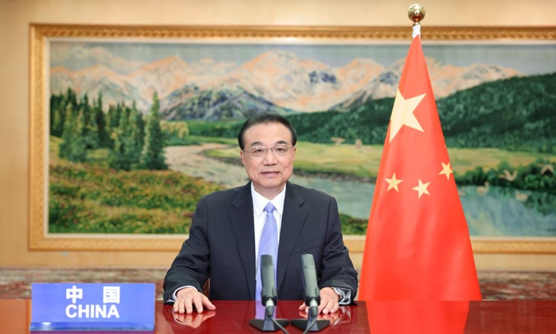 China will unswervingly open wider to outside world: Premier Li