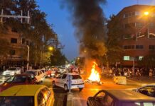 Iran stages mass rallies in response to protests