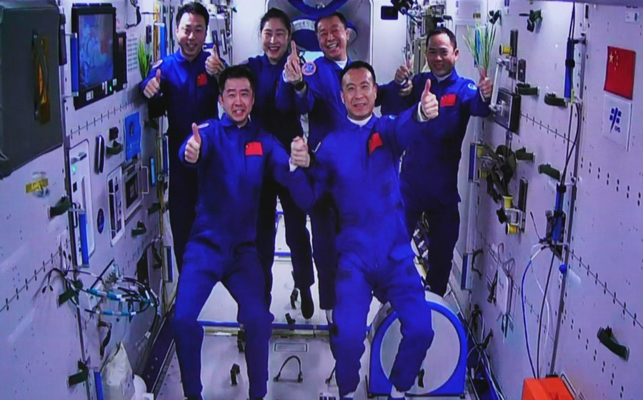 China makes history with spaceship crew gathering in orbit