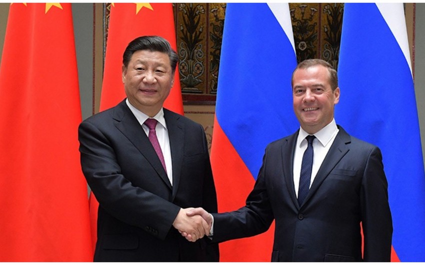 China to work with Russia for a just global governance: Xi tells Medvedev