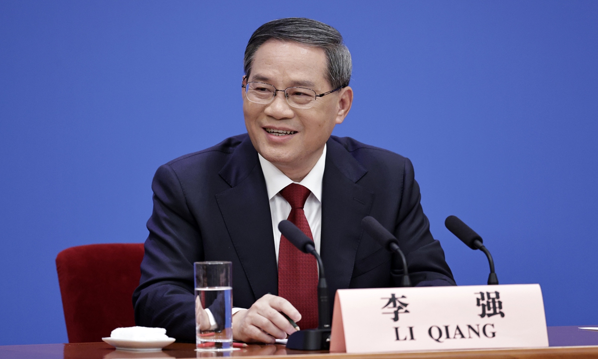 Chinese Premier's down-to-earth approach charms the world