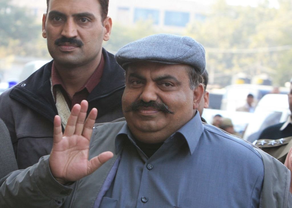 Former Indian lawmaker and brother shot dead on live TV